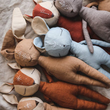 Charger l'image dans la galerie, Collection of custom linen animal spirit guardians, including mouse, hare, deer, and fox, displayed together, each with different embroidered symbols on the forehead.